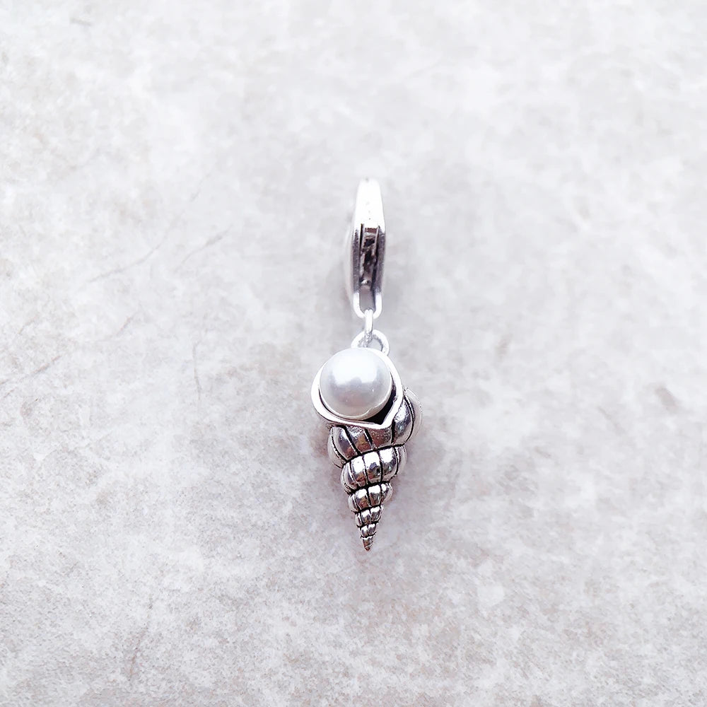 Ocean charm pendant for women and men in silver