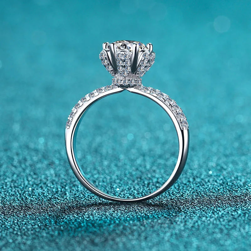 Close up of 1 carat moissanite stone on silver band