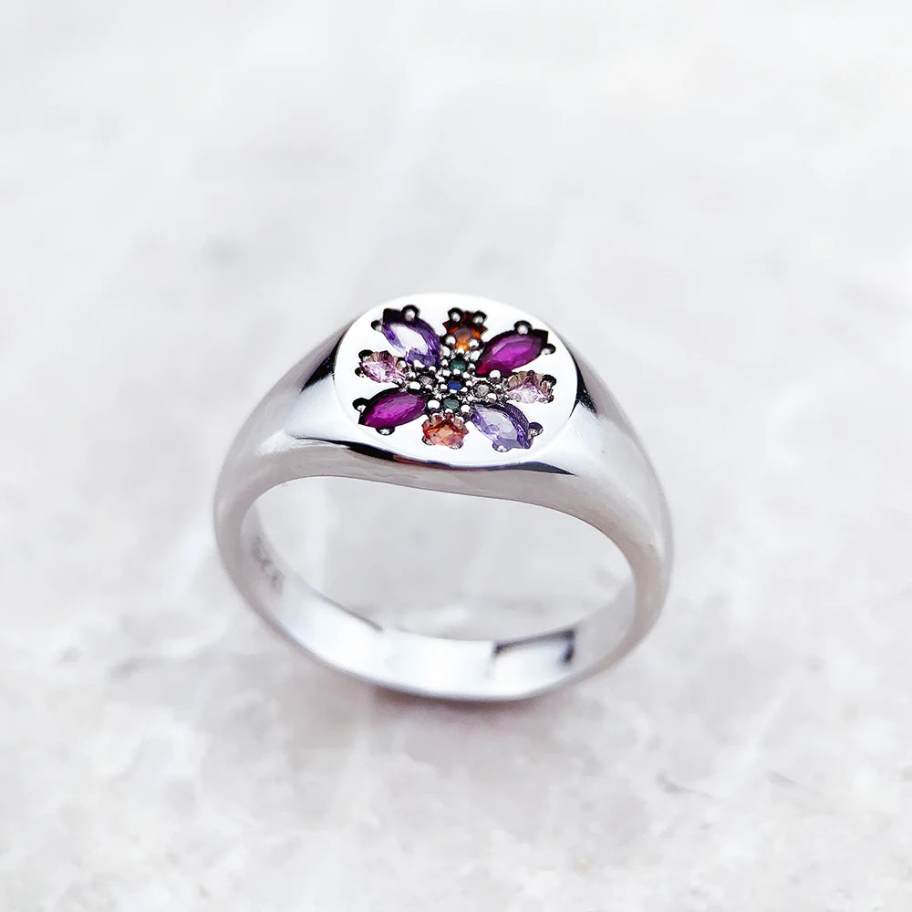 Sterling silver summer ring with floral gemstone design