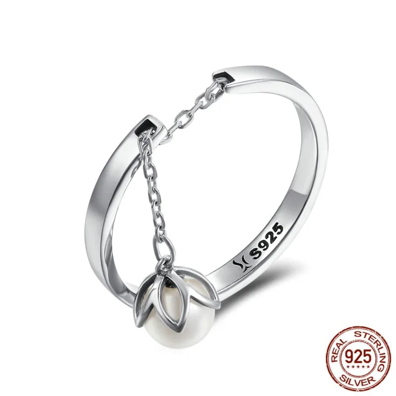 Sterling silver pearl eternity ring on display