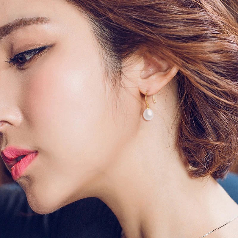 Matching pearl earrings with real 18K gold setting