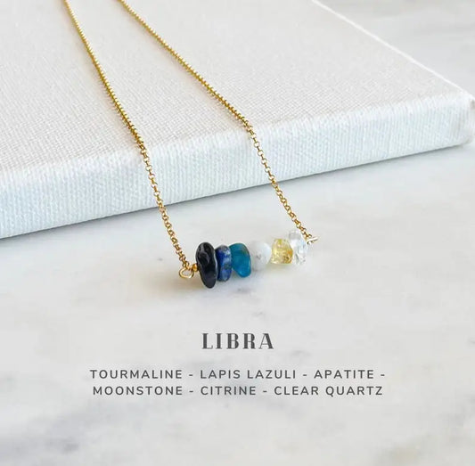 Libra crystal necklace with soft lighting
