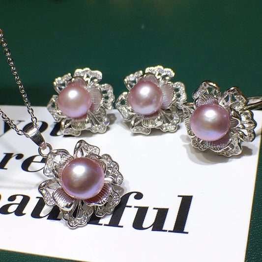 Freshwater pearl jewelry set with pendant, earrings, and ring in pink

