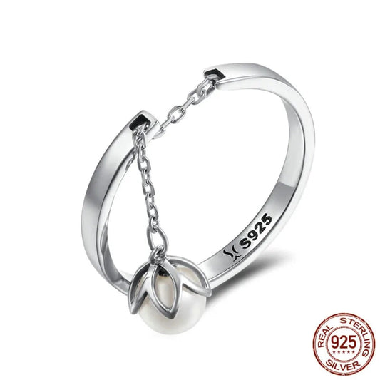 Sterling silver pearl eternity ring on display

